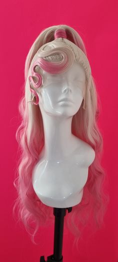 Our 'Honey Bee' wig is styled on a 13x3 hand-tied lace front wig and made from synthetic fibers. She has a stretchy wig cap that fits the majority of head sizes, along with three combs and adjustable straps that help to secure the wig to your head. Due to sanitary reasons, we do not accept returns on orders that have been dispatched, but please do contact us if there are any issues with your order. Thank you Pink Ombre Wigs, Pink And Blonde Wig, Crazy Wigs, Creative Wigs, Styled Wigs, Drag Queen Wigs, Pink Demon, Drag Wigs, High Fashion Hair