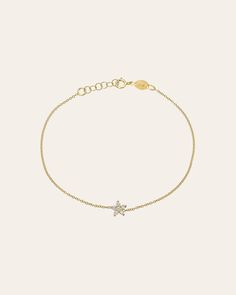 Beautifully handcrafted 14k yellow gold diamond set flower laying on a dainty cable link chain bracelet. Uber chic and timeless bracelet, perfect by itself or stacked. Made in L.A. Size of Flower: Approx. 5mm(w) by 5mm (h) Diamond Carat Weight: Approx. 0.24 ctw Total Weight: Approx. 0.9 grams Ships in 5-8 business days Comes gift ready in a custom Zoe Lev jewelry box. Elegant 14k Gold Diamond Bracelet With Cable Chain, Elegant Diamond Chain Bracelet With Delicate Chain, Luxury Diamond Bracelet With Cable Chain As Gift, Luxury Cable Chain Diamond Bracelet Gift, Delicate Yellow Gold Diamond Bracelet With Adjustable Chain, Delicate Diamond Bracelet With Adjustable Chain In Yellow Gold, Delicate Yellow Gold Diamond Bracelet With Chain, Delicate Yellow Gold Diamond Bracelet With Delicate Chain, Wishbone Necklace Gold