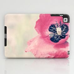 an ipad case with a pink flower on it