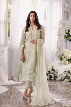 Luxury Neo Mint Embroidered Chiffon Pakistani Salwar Kameez exudes a delicate charm. The hand-embellished neck lace uplifts the look, adding a touch of sophistication. Paired seamlessly with raw silk bottoms enriched with an embroidered hem. Green Dupatta, Embroidered Hem, Pakistani Salwar, Chiffon Sleeves, Organza Sleeves, Silk Bottoms, Embroidered Chiffon, Pakistani Salwar Kameez, Pure Chiffon