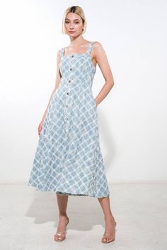 A textured denim midi dress featuring straight neckline, straps, self sash, button down detail, full skirt and back zipper closure Details: Self : 65% Cotton 35% Polyester Size & Fit - Model is 5`9" And Wearing Size Small- Measurements Taken From Size Small- Approx. Length: 41.5" Chic Cotton Denim Midi Dress, Blue Midi Dress With Adjustable Straps, Cotton Denim Midi Dress With Buttons, Summer Midi Denim Dress With Pockets, Cotton Denim Midi Dress For Casual Wear, Cotton Denim Midi Dress For Day Out, Cotton Denim Midi Dress For Dress Down Occasions, Cotton Midi Dress With Adjustable Straps, Cotton Midi Denim Dress With Button Closure