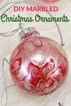 a christmas ornament is shown with the words, how to make a simple craft marbled christmas ornament