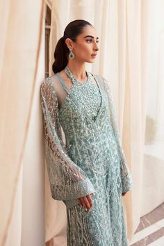 Classic Aqua Blue Embroidered Pakistani Wedding Dress Gown Shirt is a work of art featuring a chic embellished net that Evokes a sense of magnificence. Net Floor, Halter Neck Blouse, Wedding Dress Gown, Pakistani Designer Clothes, Wedding Dress Outfit, Refined Fashion, Pakistani Wedding Dress, Traditional Indian Outfits, Indian Designer Outfits