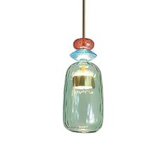 a glass light hanging from a ceiling fixture with a red and blue object in the middle