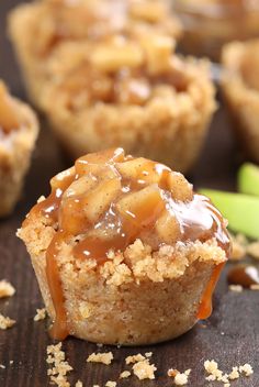 apple pie muffins with caramel glaze on top