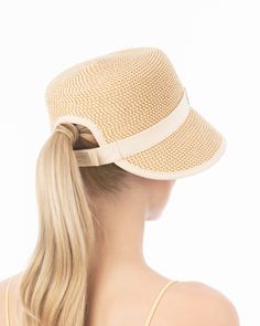 A women's designer bucket shaped sun visor for sale online inspired by women that do not want to look and feel overwhelmed by their hat. Pamie is a playful hybrid of a closed crown visor and fashionable bucket of Squishee® straw, trimmed with grosgrain ribbon for a chic, polished look. Squishee® is a man-made straw fiber resembling raffia which is lightweight, breathable and water-resistant. In addition to being environmentally friendly it offers several practical advantages including increase d Straw Visor Hat For Summer, Trendy Straw Visor Hat, Summer Visor Boater Hat In Natural Color, Adjustable Straw Visor Boater Hat, Brimmed Visor For Spring Vacation, Adjustable Straw Boater Hat With Visor, Adjustable Toquilla Straw Boater Hat Visor, Summer Visor Straw Hat For Spring, Adjustable Toquilla Straw Sun Hat With Structured Crown