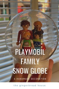 a snow globe with the words playmobil family snow globe