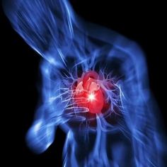 an image of a heart in the human body with blue light coming from behind it