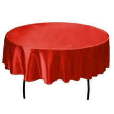 a round table with a red cloth on it