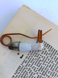 an old book with a lamp attached to it