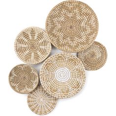 six woven baskets with circular designs on the top and bottom, arranged in different sizes