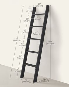 a ladder leaning up against a wall with measurements on the bottom and bottom side to show how tall it is