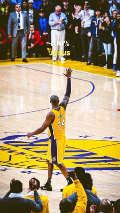 the basketball player is about to dunk the ball in front of his team mates