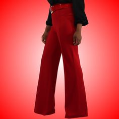 Introducing our "Nubia" Women's Pants in Red with Matching Belt—a bold and stylish choice for the modern woman. These pants come in a vibrant red color that exudes confidence and flair. The center seam in the front of each leg adds a trendy and elongating effect. The gold belt buckle complements the hues', providing a chic and coordinated look. With a back zip closure, these pants offer a sleek and flattering fit. Step into the spotlight with these eye-catching pants in red, perfect for making a Formal Red Wide-leg Pants, Red Wide Leg Pants For Formal Occasions, Red Wide-leg Bottoms For Formal Occasions, Formal Red Wide Leg Bottoms, Red Wide Leg Cargo Pants, Chic Red Wide Leg Full Length Pants, Chic Red Full Length Wide Leg Pants, Elegant Red Flare Bottoms, Red Wide Leg Bottoms For Evening