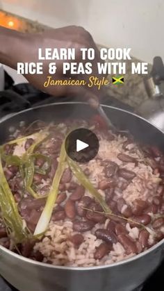 someone is cooking rice and beans with green onions in a pan on top of the stove