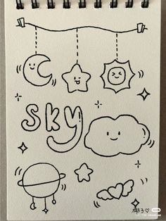 a notebook with some doodles on it and the words sky written in black ink