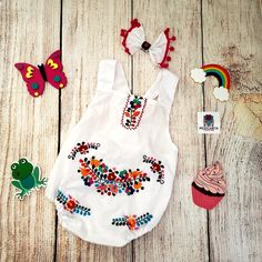 Ready to party??? Let's taco-bout it These Mexican Rompers for baby girls are adorable. Completely handmade Embroidered Set includes Romper Bow Embroidery colors will vary. Ready to ship in 1 day. No returns. Fun Multicolor Sleeveless Sets, White Summer Festival Sets, Red Summer Birthday Sets, Bohemian Embroidered Summer Sets, Spring Party Sets With Multicolor Embroidery, Summer Festival Cotton Sets, Playful Summer Party Sets, Sleeveless Summer Sets With Multicolor Embroidery, Sleeveless Sets With Multicolor Embroidery For Summer