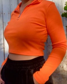 bright orange ribbed long sleeve, quarter-zip up 95% polyester, 5% spandex model is wearing a medium measurements: bust 35", waist 29", hip 39" Orange Crop Top Outfit, Orange Outfits Aesthetic, Bright Orange Outfit, Half Zip Outfit, Orange Top Outfit, Orange Shirt Outfit, Korean Top, Leo Rising, Orange Crop Top