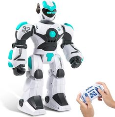 a robot is holding up a can of soda to someone's hand while they are playing with it