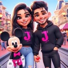 two people standing next to each other in front of a train track with mickey and minnie mouse