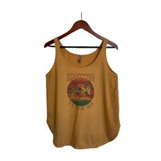 This faded distressed Led Zeppelin Band Tee tank top is perfect to dress up or wear casual. The image is sublimated onto the material making the top buttery soft! Fabric: 65% Polyester 35% Combed Ring-Spun Cotton Led Zeppelin Band Vintage Retro Faded Distressed Tank Top Tee, Short Sleeve Tank Top, Tank Top for Women, Boho Hippie Clothing, 90s Fashion Vintage Tank T-shirt For Summer, Vintage Distressed Tops With Relaxed Fit, Vintage Distressed Top With Relaxed Fit, Vintage Relaxed Fit Distressed Top, Vintage Faded Tops For Spring, Light Vintage Tops For Spring, Retro Distressed Cotton Tops, Vintage Distressed Tops For Spring, Grunge Relaxed Fit Tops For Festival