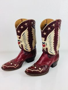 Vintage Eagle & Hearts Cowboy Boots killer custom eagle & hearts inlay design! squared off toe stack wood heel 2 tone red leather with white to off set design huge eagle at front & back stars trim with white piping trim hearts at toe front & back heel by bronco great vintage condition, minor surface wear appx size - 7  10.5 toe-heel 12 tall 3.75 wide 1.5 heel All sales are final Fitted Red Vintage Boots, Fun Cowboy Boots, Vintage Hand Tooled Boots With Round Toe, Vintage Hand-tooled Boots With Round Toe, Vintage Hand-tooled Boots For Western-themed Events, Vintage Red Boots With Leather Sole, Painted Cowboy Boots, Cowboy Boots Aesthetic, Cowgirl Things