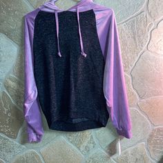 Black And Purple Hoodie With No Pocket. The Purple Is Velvet On The Sleeves. Black Is Very Soft And Stretchy Material. Never Worn. Tags Still On It! Trendy Purple Sweater For Streetwear, Purple Long Sleeve Sweater For Streetwear, Trendy Purple Hooded Sweatshirt, Trendy Hooded Purple Sweatshirt, Purple Hooded Winter Top, Trendy Purple Long Sleeve Hoodie, Casual Purple Hooded Sweater, Casual Hooded Purple Sweater, Trendy Purple Hoodie With Drawstring