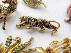 "Gorgeous statement Tiger Pin in gold tone enamel with pave rhinestones. Surface is raised texture. Very nice quality designer pin, in vintage condition. Fully functional. measures 1 1/4\" tall by 2 1/2\" across. I will ship this item 1st class mail within one business day upon receipt of payment. Thank you. Enjoy." Gold Enamel Costume Jewelry Brooches, Collectible Gold Brooches With Rhinestones, Collectible Gold Enamel Pins, Vintage Tiger, Brooch Vintage, Rhinestone Brooches, Vintage Brooches, Brooch Pin, Business Day