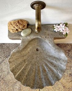 a bathroom sink sitting on top of a wooden floor