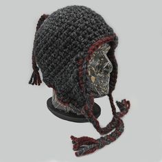 Hand Crocheted Chunky Ear Flap Hat (Ready To Ship) This ear flap hat was crocheted with two colors of chunky wool blend yarn. The color used for the main portion of the hat and the ear flaps is Charcoal. The colors Charcoal and Claret are both used in the ear flap braids, the back braid, and the trim around the bottom portion of the hat. Material: - 80% Acrylic, 20% Wool - Lion Brand Approximate measurements: - Adult Large Head size 23.5 - 25 inches (60 - 64 cm) - Circumference above ears: 23.5 Adjustable Beanie For Winter, Adjustable Beanie Costume Hat For Winter, Adjustable Gray Hat Bands For Winter, Handmade Adjustable Hat Bands For Winter, Adjustable Short Brim Crochet Hat For Winter, Adjustable Winter Crochet Hat With Short Brim, Handmade Adjustable Beanie With Curved Brim, Adjustable Yarn Hat For Outdoor, Handmade Beanie For Outdoor