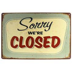 a sign that says sorry we're closed