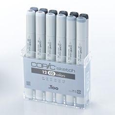 six white batteries in a clear holder on a white background with the words coppa sketch 12 co - colors