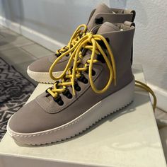 Grey And Cream Hiking Sneaker - Women’s 38 - Never Worn - Comes With Dust Bags, Original Box And Extra Shoe Laces Gray Low-top Boots With Vibram Sole, Sporty Gray Leather Boots, Fear Of God Shoes, Hiking Sneakers Women, Hiking Sneakers, Fear Of God, Lace Up Boots, Shoe Laces, Original Box