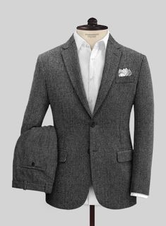 Stand out for all the right reasons this season with the gray macro weave tweed suit offering a perfectly tailored piece to complete sartorial looks. Crafted from wool, the vintage tweed suit offers a luxurious hand feel. Pair with a crisp white shirt and knitted tie for a modern finish, or layer up with a rollneck for a smart winter look. 
 
Look Includes   Vintage Gray Macro Weave Tweed Fabric  Two Button Jacket Style  Notch Lapel  Horn Royal Black Button  Single Vent  Three Cuff Buttons  Two Vintage Tweed Jacket, Grey Tweed Suit, Herringbone Tweed Jacket, White Linen Suit, Green Velvet Jacket, Peaky Blinders Suit, Royal Blue Suit, Tweed Suit, Blue Chinos