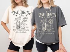 two women standing next to each other wearing t - shirts that say the bride and the bachelor