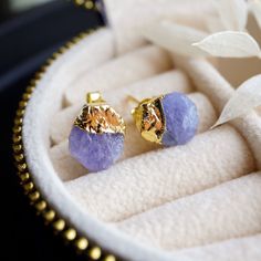 💜 These boho-chic Tanzanite stud earrings are a beautiful December birthstone gift for any lover of raw crystal jewelry. Crafted with natural Tanzanite gemstones, each earring boasts its own unique hue and shape, adding to its natural beauty. The raw, unpolished finish enhances their bohemian appeal, making them the perfect choice for any free-spirited individual 💜 CLEARANCE STOCK - NON RETURNABLE ⭒ Material: ear post is 925 sterling silver for all colors. The color plating on the gemstone is Bohemian Earrings With Gemstone Accents For Gift, Amethyst Earrings For Gift, Bohemian Amethyst Crystal Earrings For Gift, Bohemian Amethyst Crystal Earrings As Gift, Bohemian Crystal Gemstone Earrings For Gift, Purple Crystal Earrings For Gift, Spiritual Crystal Earrings As Gift, Gold Crystal Gemstone Earrings As Gift, Gold Gemstone Crystal Earrings As Gift