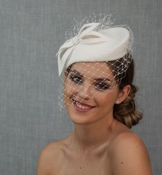 White bridal pillbox hat from fur felt. Percher hat. White wedding hat with face veil. Dutchess Kate style pillbox hat. Face Veil, Bridal Hat, Birdcage Veil, Wedding Hat, Cocktail Hat, Pillbox Hat, Light Ivory, Fancy Hats, Civil Wedding