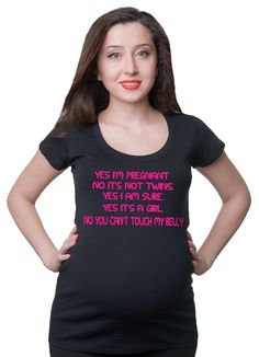 a pregnant woman wearing a black shirt with blue writing on the front and bottom half