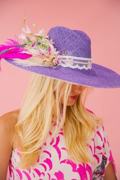 Add a pop of color with our Purple Haze sun hat. The playful ribbon band, adorned with white and pink feathers and pink flowers, will make you feel like a Derby winner. Keep the sun out of your eyes and your style on point with this quirky hat. This hat is ONE OF A KIND, created by our owner Stephanie. To receive item quicker, expedited shipping is available at checkout. Derby Winners, Pink Feathers, Sun Hat, Sun Hats, Your Eyes, Make You Feel, Pink Flowers, Derby, Feathers