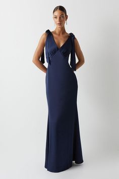 You name the occasion, we have the perfect dress. From maxi to mini and everything in between, find your dream dress to feel confident in. Choose classic shift dresses and flowing floor-length pieces for a timeless style, plus discover on-trend bardot and wrap dresses to wear on repeat. Style: Satin Back Crepe Tie Shoulder Bridesmaids Dress.  Ideal for: Bridesmaids.  Design: Tie.  Model wears size UK 10 and is 5' 9" tall. Italy Wedding Guest Dress, Bridesmaid Dresses Black Tie, Black Tie Party Outfit, Black Tie Attire For Women, Black Tie Dress Code Women, Black Tie Dresses Formal, Wedding Guess Dress, Black Tie Wedding Guest Dress, Formal Wedding Attire