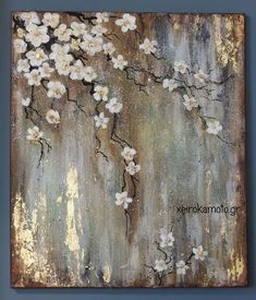 a painting with white flowers painted on it