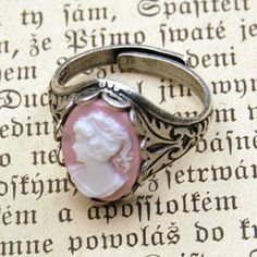 Oxidized sterling silver plated ring which is adjustable and has oak leaf details on the sides. In the center is a 14x10mm pink and white girl cameo. Vintage Packaging, Cameo Ring, Pink Lady, Party Rings, Oak Leaf, Pink Ring, Plated Ring, Oxidized Sterling Silver, Gift Accessories