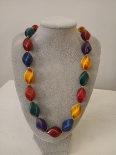 Italian made colorful stone Arlequin necklace, 30 inches, excellent condition Multicolor Single Strand Costume Jewelry, Multicolor Single Strand Long Necklace As Gift, Multicolor Long Necklace With Faceted Beads As Gift, Handmade Multicolor Necklaces With Oval Beads, Multicolor Costume Jewelry Necklace With Polished Beads, Multicolor Polished Beads Necklace In Costume Jewelry Style, Unique Multicolor Necklaces With Faceted Beads, Multicolor Long Necklace With Colorful Beads As A Gift, Multicolor Long Necklace With Polished Beads For Gift