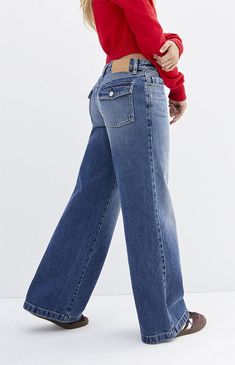 Step into a classic this season with the Casey Dark Indigo Seam Low Rise Baggy Jeans from PacSun. Boasting a trendy low-rise waist, these jeans feature wide-leg openings with a baggy fit, a wide seam hem, and button-flap back pockets, offering comfort and style in one go-to pair of denim. They're made with sustainably sourced cotton for an eco-friendly update.Model is wearing a size 26Model measurements: 5’7” height, 32” bust, 23” waist, 34” hipLearn more about PacSun eco items PacSun Womens Cas Vintage Patchwork Jeans, Fall Basics For Women, Fair Jeans, Mid Rise Jeans Outfit, Dry Goods Clothing, Back Pocket Jeans, Low Rise Baggy Jeans, Jeans Pacsun, Quoi Porter