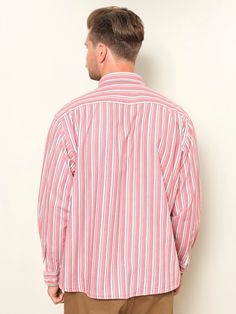 "This is a very charming and comfortable vintage 90's striped men's shirt in pink-blue. Durable and functional garment. Made of cotton. Vintage condition level 4 (very minor signs of wear) MODEL measurements: 6 ft (180 cm); he wears the size available. SIZE: Marked size: XL. To be sure the size will fit check the sizing details listed below. FLAT Measurements: Length from shoulder: 29 1/2 \" / 74,5 cm Armpit to armpit: 28 \" / 71,5 cm SKU: M8274 AMP * We assess the condition of our vintage items Casual Long Sleeve Pink Shirt, Casual Collared Shirt With Vertical Stripes, Casual Long Sleeve Shirt With Vertical Stripes, Casual Relaxed Fit Shirt With Vertical Stripes, Long Sleeve Cotton Tops With Vertical Stripes, Casual Pink Long Sleeve Shirt, Oversized Long Sleeve Retro Shirt, Pink Retro Shirt With Relaxed Fit, Pink Long Sleeve Shirt Outfit Men