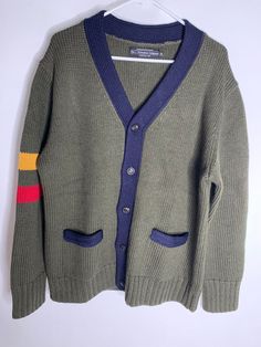 J Peterman Italian Wool Ivy League Cardigan Mens Size XL Olive green (a bit more green than photos may suggest) 100% merino wool (this thing is HEAVY!) New without tags Retail is $329 Measures about 23" across and 28" top to bottom N BOX 18 Man Cardigan, J Peterman, Classic Clothing, Shopping Clothes, Green A, Ivy League, Streetwear Fashion Women, Online Shopping Clothes, Cardigan Sweater