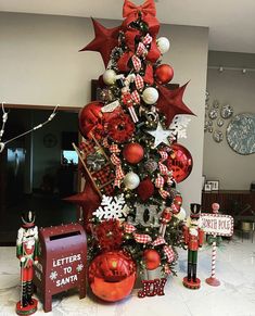 a christmas tree decorated with red and white ornaments