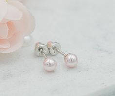 Sterling silver high-end simulated pink pearl stud earrings for little girls - a classic that goes with everything!  This makes a wonderful birthday gift for kids, keepsake children's jewelry.  Beautiful flower girl gift, granddaughter gift, or just because.   🌸Earrings are sterling silver with rhodium plating to prevent tarnish keeping them beautiful for years to come. 🌸Earrings are hypo-allergenic and should not irritate sensitive ears and have shortened posts for kids so they don't poke the Hypoallergenic Pink Pearl Earrings As Gift, Hypoallergenic Pink Pearl Earrings For Gift, Classic Pink Pearl Earrings As A Gift, Classic Pearl Jewelry, Pink Pearl Earrings, Heart Gift Box, Earrings Classic, Velvet Heart, Cute Gift Boxes