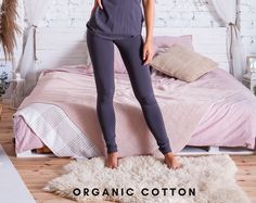 Organic cotton leggings The model is wearing -ANTRACITE color- MATERIAL 95% Organic Cotton, 5% Elastane. The Global Organic Textile Standard is a mark of quality for organic cotton. GOTS fabrics are better for people and the environment. Fabrics are produced without the use of genetically modified seeds, harmful pesticides, or dyes. There is no forced labour or child labour in the production chain. FEATURES > classic cut > full length ~ 98cm / 35,58'' SIZING My Size Guide in pictures will help you define the perfect size match.   DELIVERY Your item is made-to-order and will be ready within 2-7 days.  Average delivery times: > North America: up to 1-2 weeks > New Zealand, Australia: up to 2-3 weeks > Europe: up to 1 week More items from organic fabrics here etsy.com/shop/WeLoveOrganic Comfort Stretch Footless Bottoms For Loungewear, Footless Tight Cotton Leggings, Fitted Cotton Footless Pants, Stretch Cotton Footless Tights, Comfortable Cotton Leggings, Comfortable Fitted Cotton Leggings, Fitted Cotton Yoga Bottoms, Stretch Cotton Tights, Cotton Yoga Leggings