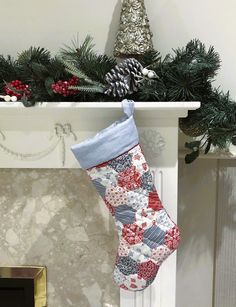 a christmas stocking hanging from a fireplace mantel